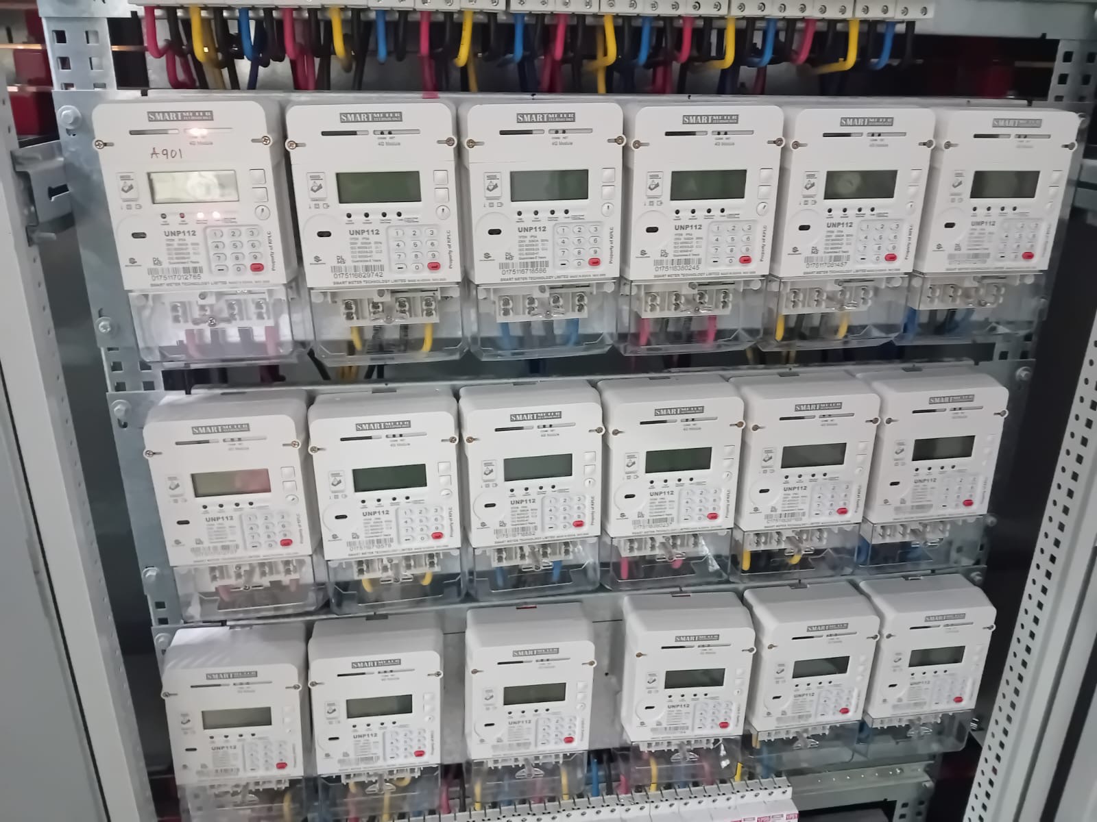 Services Multi-tenant electrical metering panel with multiple single-phase prepaid energy meters installed by Sha Technical Solutions Ltd.
