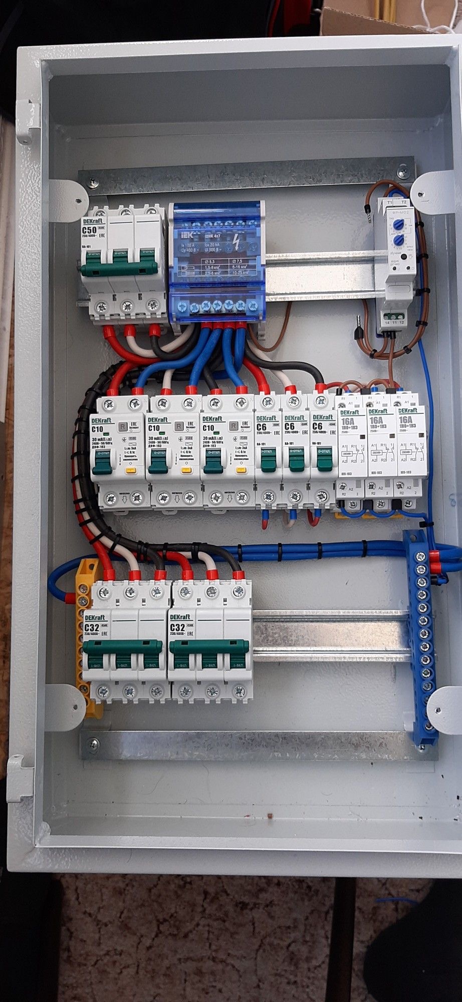 About Electrical control panel with circuit breakers, relays, timer relay, and neatly organized wiring installed by Sha Technical Solutions Ltd.